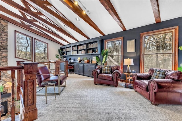 living area featuring light colored carpet and lofted ceiling with beams