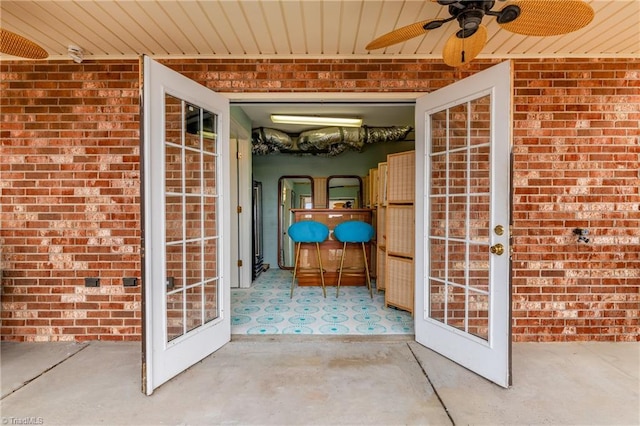 view of patio featuring ceiling fan