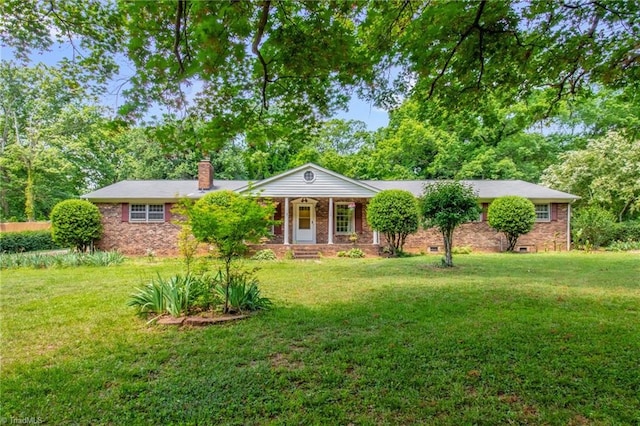 206 Westwood Dr, Kernersville, NC 27284 - view of front of house with a porch, a chimney, and a front yard