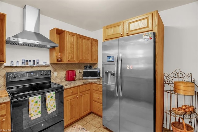 206 Westwood Dr, Kernersville, NC 27284 - kitchen featuring light stone countertops, light tile patterned floors, wall chimney exhaust hood, backsplash, and appliances with stainless steel finishes
