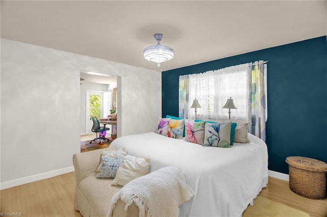 206 Westwood Dr, Kernersville, NC 27284 - bedroom featuring wood finished floors and baseboards