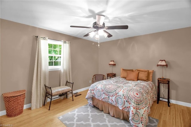 206 Westwood Dr, Kernersville, NC 27284 - bedroom with baseboards, a ceiling fan, and wood finished floors