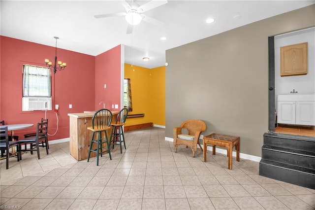 206 Westwood Dr, Kernersville, NC 27284 - dining area featuring light tile patterned floors, ceiling fan with notable chandelier, cooling unit, baseboards, and recessed lighting
