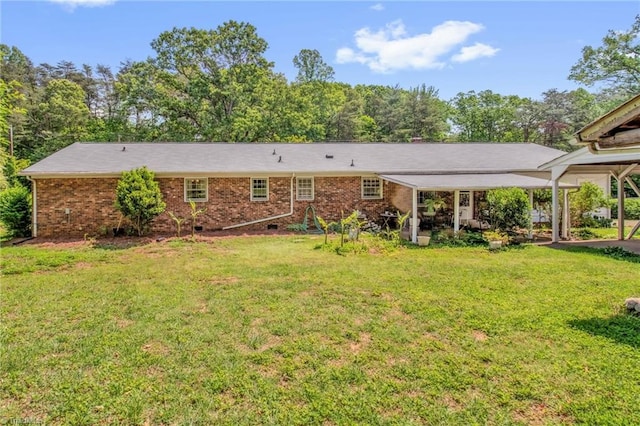 206 Westwood Dr, Kernersville, NC 27284 - back of property with a yard, crawl space, and brick siding