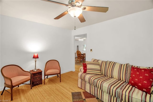 206 Westwood Dr, Kernersville, NC 27284 - living room featuring baseboards, light wood finished floors, and ceiling fan