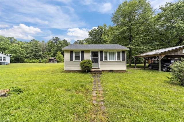 131 J Nettie Dr, Lexington, NC 27292 - view of front of home with crawl space, a front yard, and a detached carport