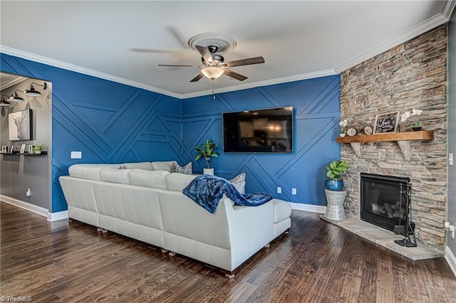 3855 Rutherford Ct, Winston-Salem, NC 27106 - living room with a ceiling fan, crown molding, a stone fireplace, wood finished floors, and baseboards