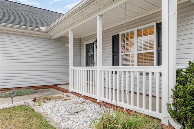 property entrance featuring a porch