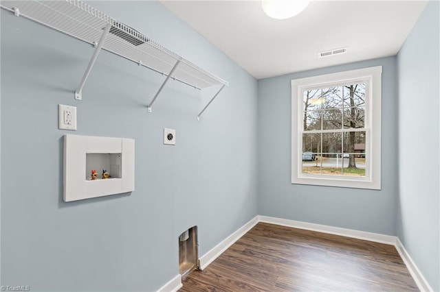 laundry room featuring electric dryer hookup, washer hookup, and dark hardwood / wood-style floors