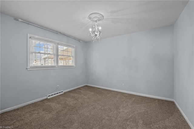 unfurnished room with a notable chandelier and carpet flooring