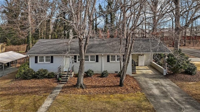 ranch-style house with a carport