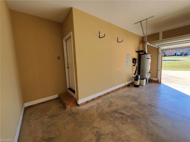 garage with gas water heater, electric panel, and baseboards