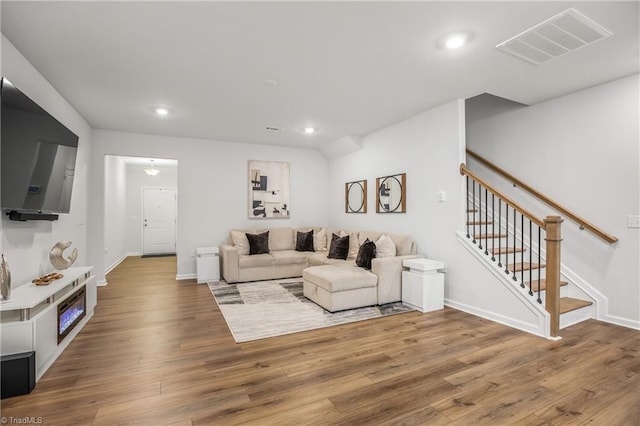 living room with hardwood / wood-style flooring