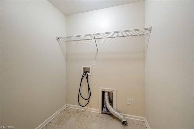 825 Central Park Ave, Greensboro, NC 27407 - laundry room with washer hookup, baseboards, and light tile patterned flooring