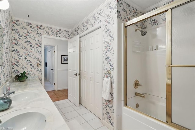 174 Sunny Knoll Ln, Boone, NC 28607 - full bathroom featuring wallpapered walls, crown molding, tile patterned floors, shower / bath combination with glass door, and double vanity