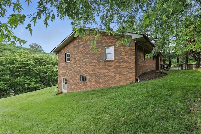174 Sunny Knoll Ln, Boone, NC 28607 - view of side of home featuring a yard and brick siding