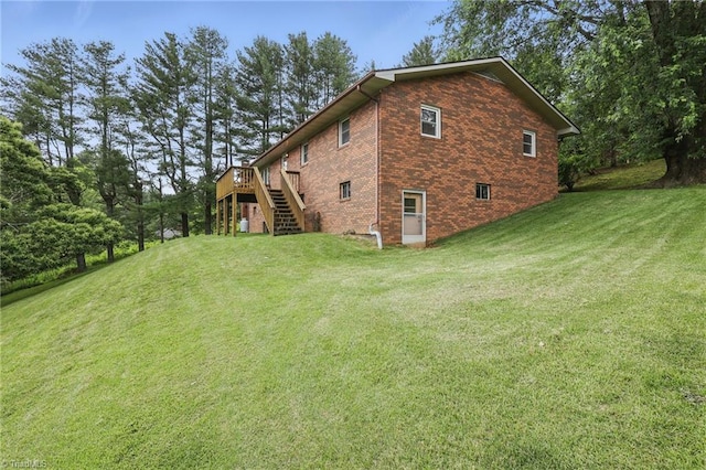 174 Sunny Knoll Ln, Boone, NC 28607 - view of property exterior featuring stairway, brick siding, a deck, and a yard