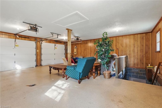 174 Sunny Knoll Ln, Boone, NC 28607 - garage with a garage door opener and wood walls