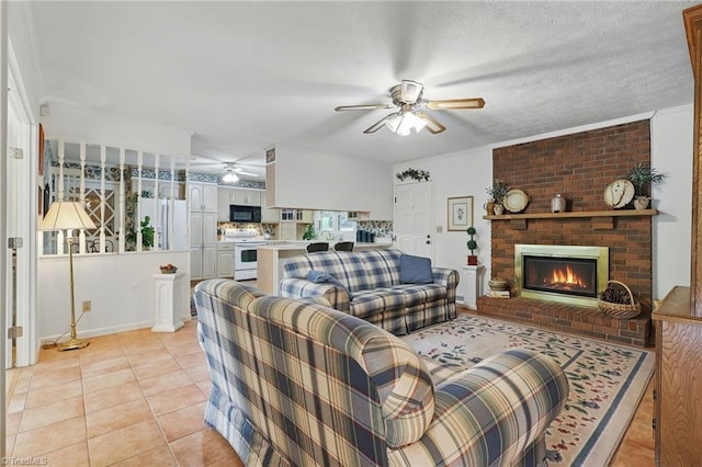 174 Sunny Knoll Ln, Boone, NC 28607 - living area with ceiling fan, a brick fireplace, and light tile patterned flooring
