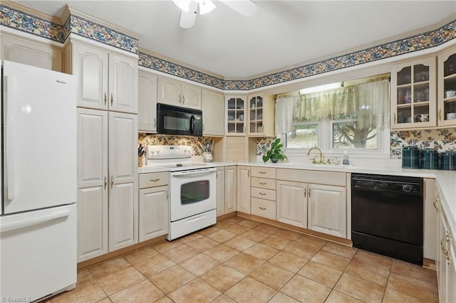 174 Sunny Knoll Ln, Boone, NC 28607 - kitchen featuring black appliances, tasteful backsplash, glass insert cabinets, a ceiling fan, and light countertops