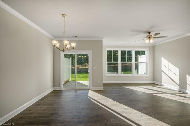 1404 Amberview Ln, Kernersville, NC 27284 - unfurnished dining area featuring crown molding, ceiling fan with notable chandelier, baseboards, and dark wood finished floors