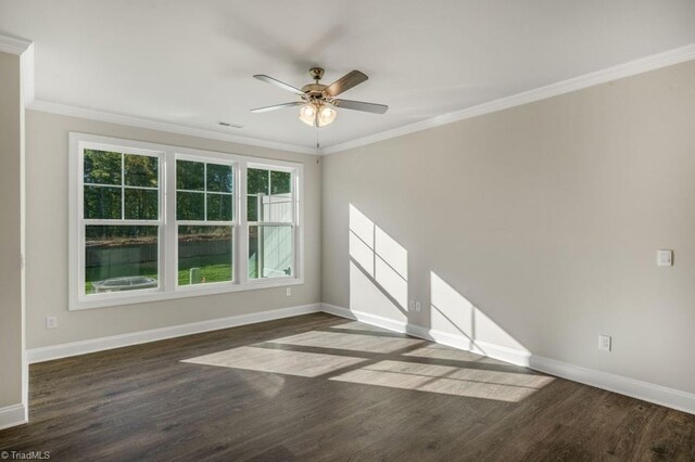 1404 Amberview Ln, Kernersville, NC 27284 - unfurnished room with wood finished floors, a ceiling fan, and baseboards