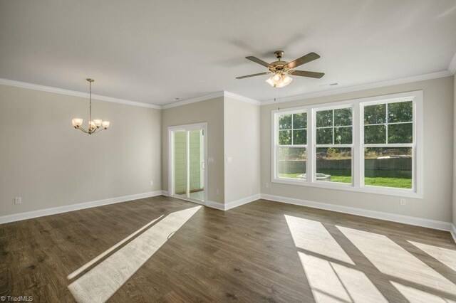 1404 Amberview Ln, Kernersville, NC 27284 - spare room featuring baseboards, crown molding, dark wood-type flooring, and ceiling fan with notable chandelier
