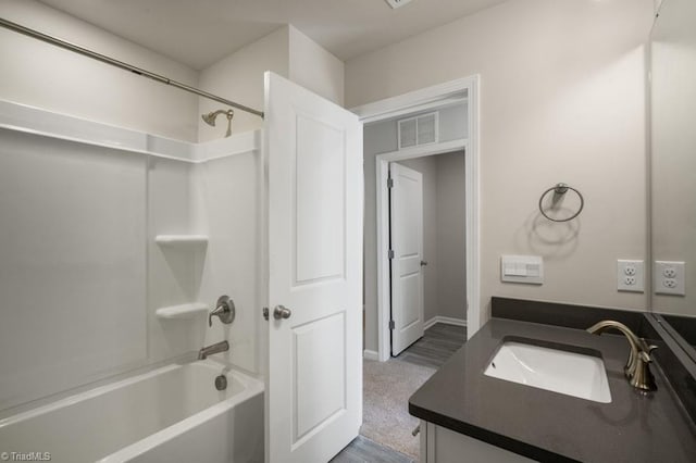1404 Amberview Ln, Kernersville, NC 27284 - bathroom featuring shower / bathing tub combination, baseboards, visible vents, and vanity