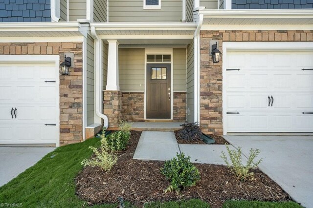 1404 Amberview Ln, Kernersville, NC 27284 - entrance to property featuring stone siding and concrete driveway