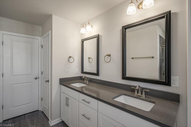 1404 Amberview Ln, Kernersville, NC 27284 - full bathroom featuring a sink and double vanity