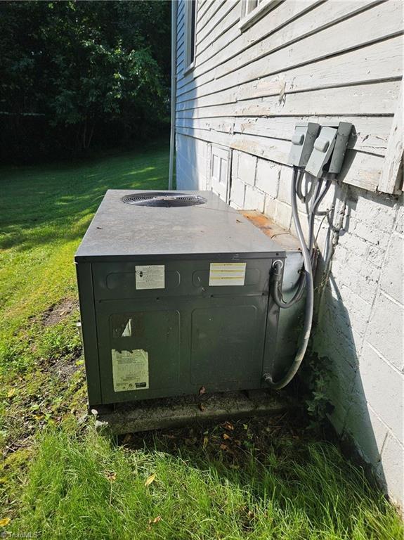215 9th St, Spencer, NC 28159 - exterior view of a cooling unit