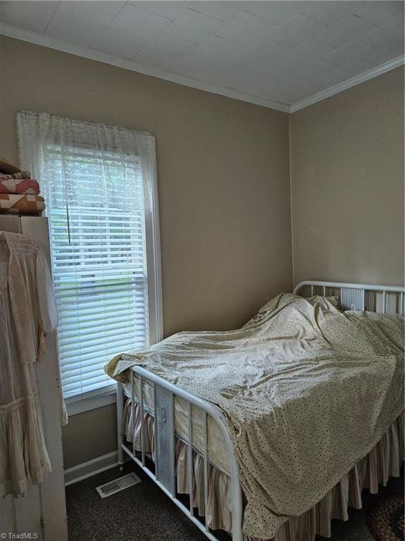 215 9th St, Spencer, NC 28159 - bedroom with ornamental molding and carpet flooring