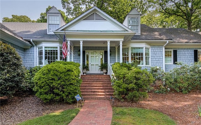 view of front of home with roof with shingles