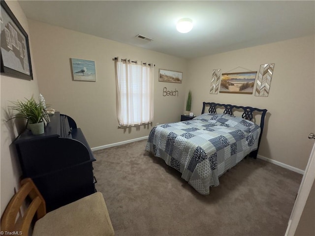 bedroom featuring carpet, visible vents, and baseboards