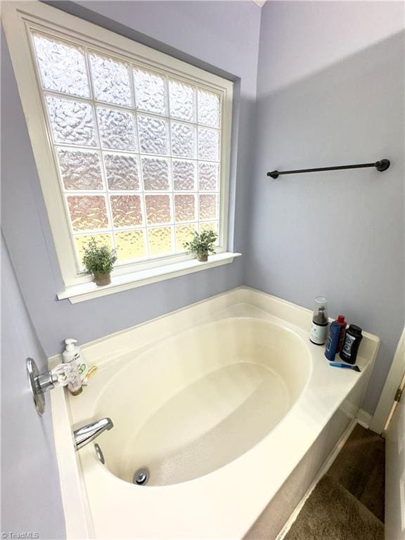 bathroom with a bath