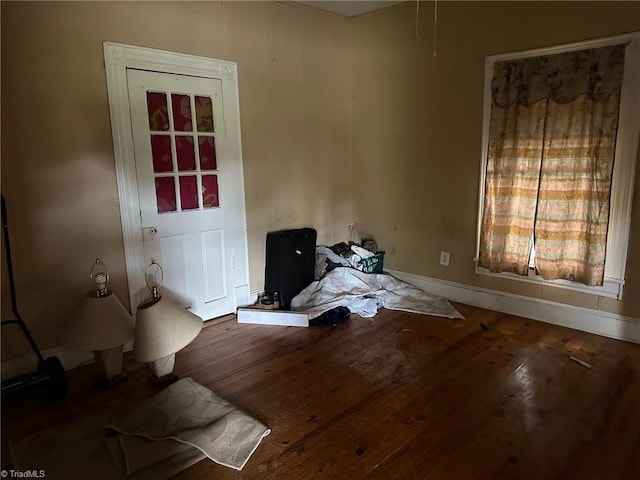 spare room with hardwood / wood-style floors