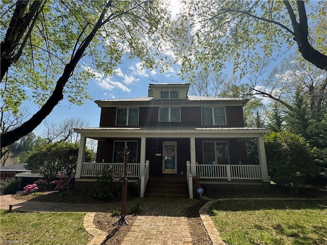 209 Abernathy St NW, Lenoir, NC 28645 - american foursquare style home with a porch, brick siding, and a front lawn