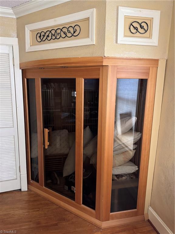 209 Abernathy St NW, Lenoir, NC 28645 - detailed view of crown molding and wood finished floors