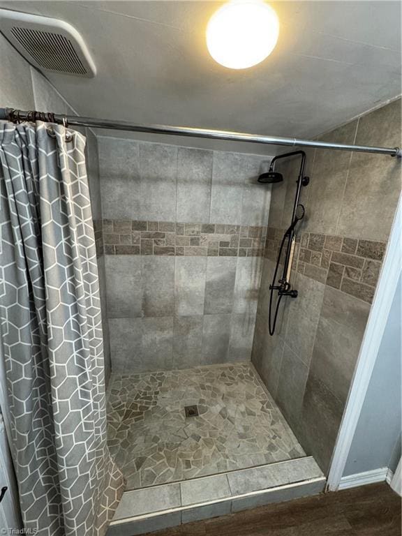 209 Abernathy St NW, Lenoir, NC 28645 - bathroom with tiled shower