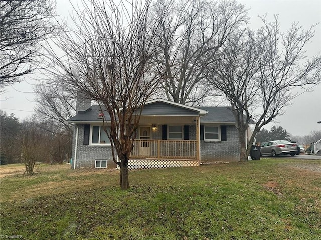 view of front of house featuring a front lawn and a porch