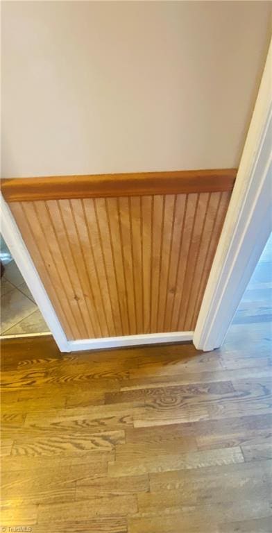 stairway featuring hardwood / wood-style flooring