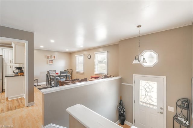 entrance foyer with light hardwood / wood-style flooring