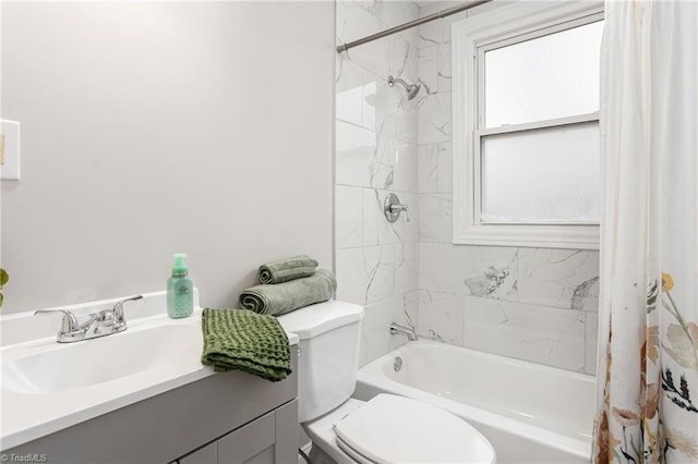 full bathroom featuring toilet, vanity, and shower / bath combo