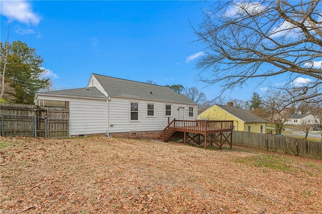 back of house featuring a wooden deck, stairs, a lawn, a fenced backyard, and crawl space