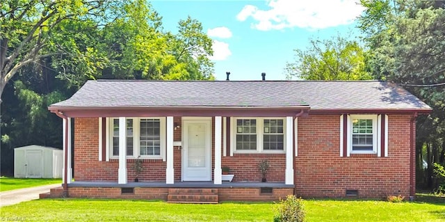 2102 Bothwell St, Greensboro, NC 27401 - view of front of home with crawl space, brick siding, and a front yard