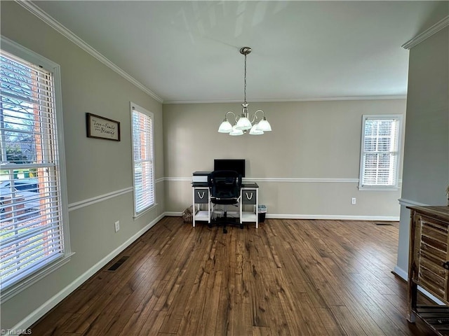 office with dark hardwood / wood-style flooring, ornamental molding, and a notable chandelier