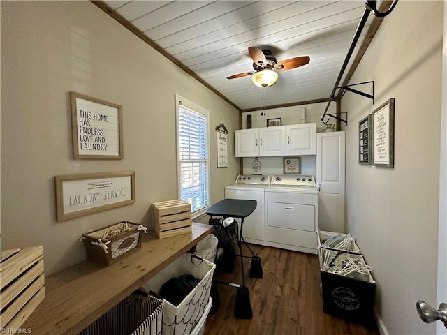 laundry area featuring ceiling fan, dark wood-type flooring, cabinets, washer and clothes dryer, and ornamental molding