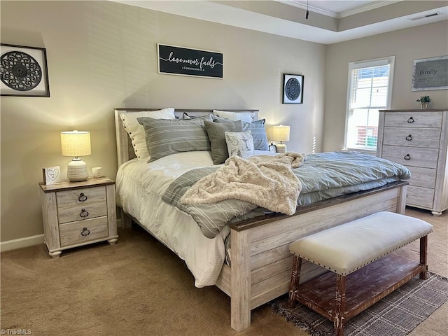 carpeted bedroom with crown molding