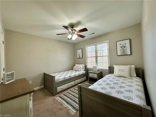 bedroom featuring ceiling fan and light colored carpet