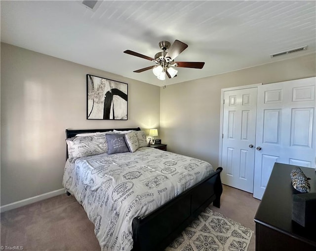 bedroom featuring ceiling fan, carpet floors, and a closet